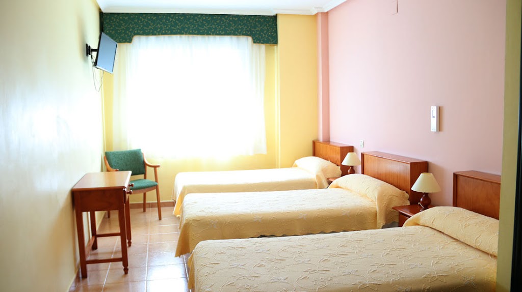 Hostal Elvira — Habitaciones