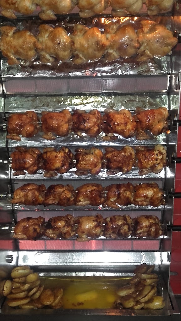 Pollos y Pizzas Ortiz — Ambiente