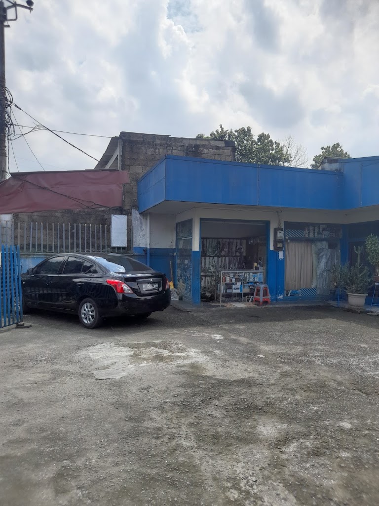 Bengkel spesialis pintu Abadi jaya