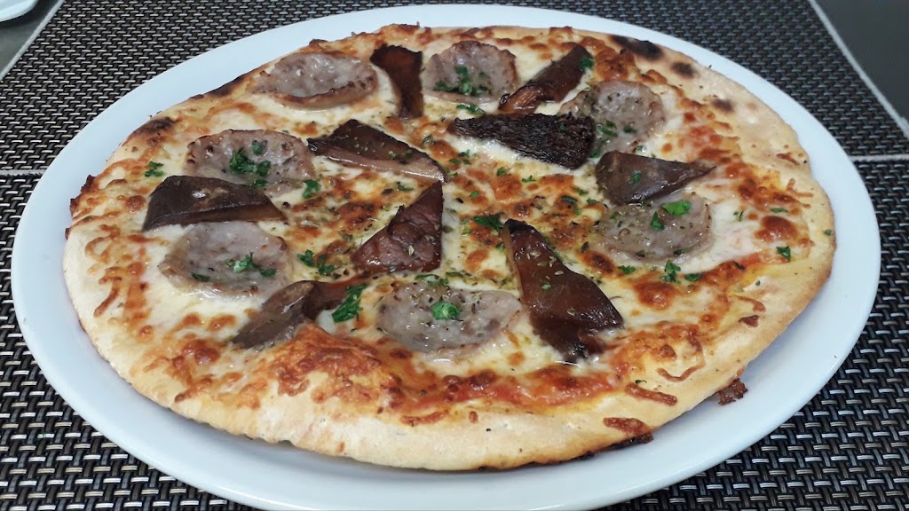 Restaurant Pizzeria Braseria El Fanalet — Comida y bebida