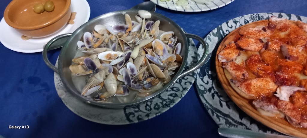 CASA JULIO RANDO — Comida y bebida