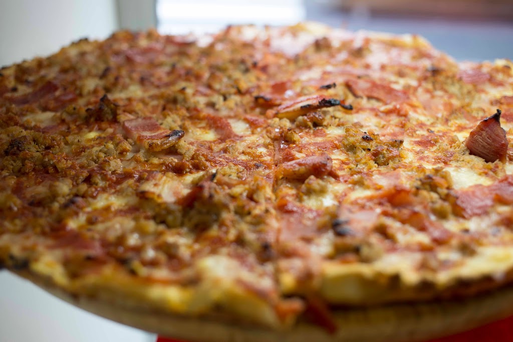 Pizzeria Hermanos Gonzalez — Comida y bebida