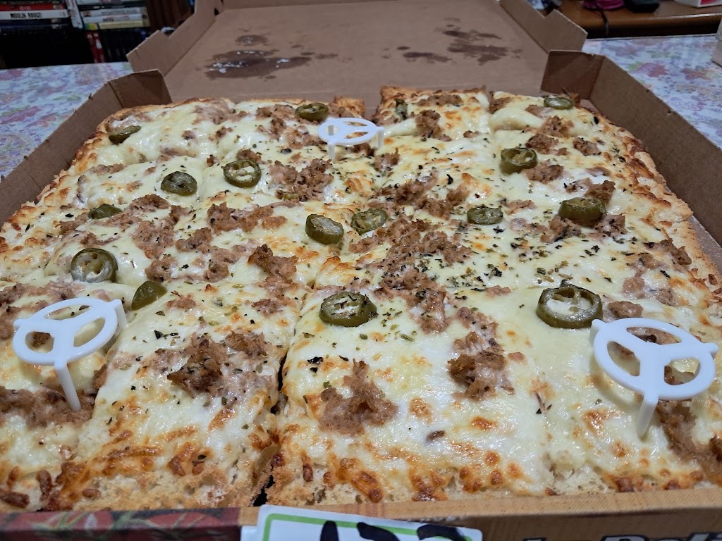Pizzeria Que Rick'o — Comida y bebida