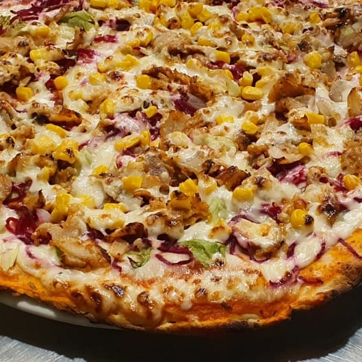 Pizzeria Doyca — Comida y bebida