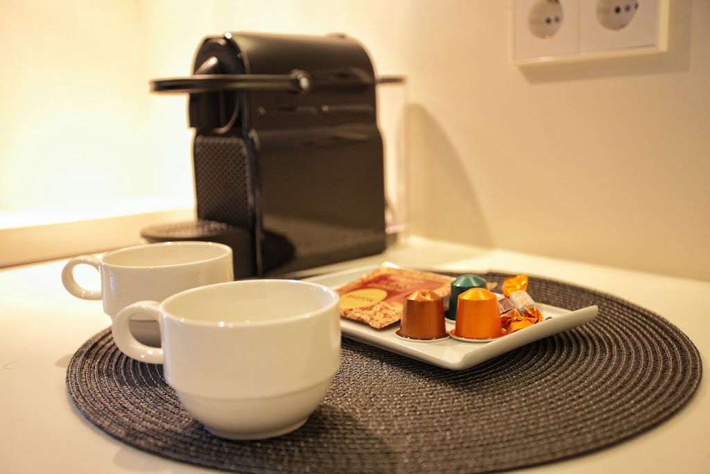 San Lorenzo Suites — Comida y bebida