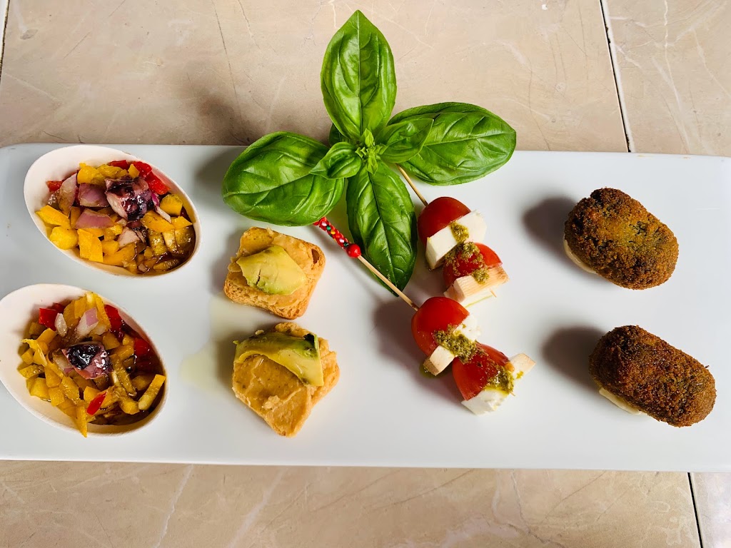 Restaurante Tasca los 5 sentidos — Comida y bebida