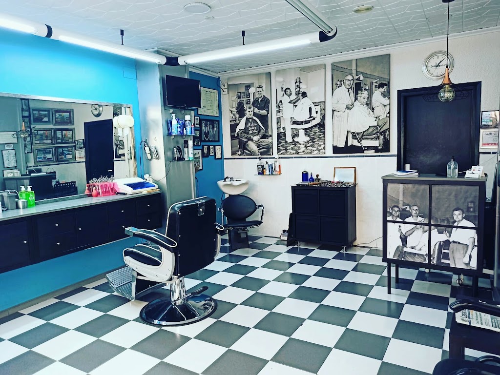 Juan Carlos Peluqueria Homens — Interior