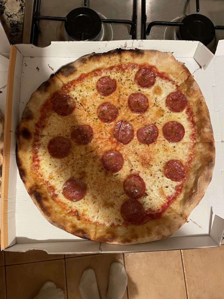 Pizzeria la Artesana — Comida y bebida