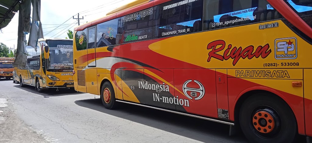 MELAYANI SERVIS GANTI OLI