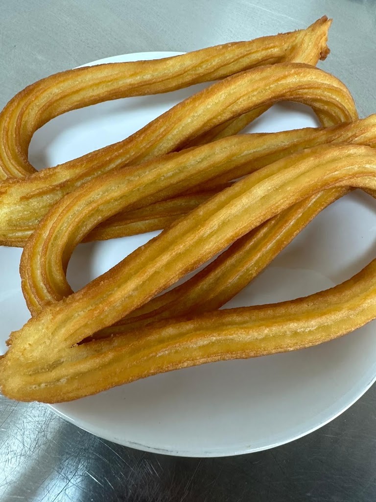 Churreria Mamatita — Comida y bebida