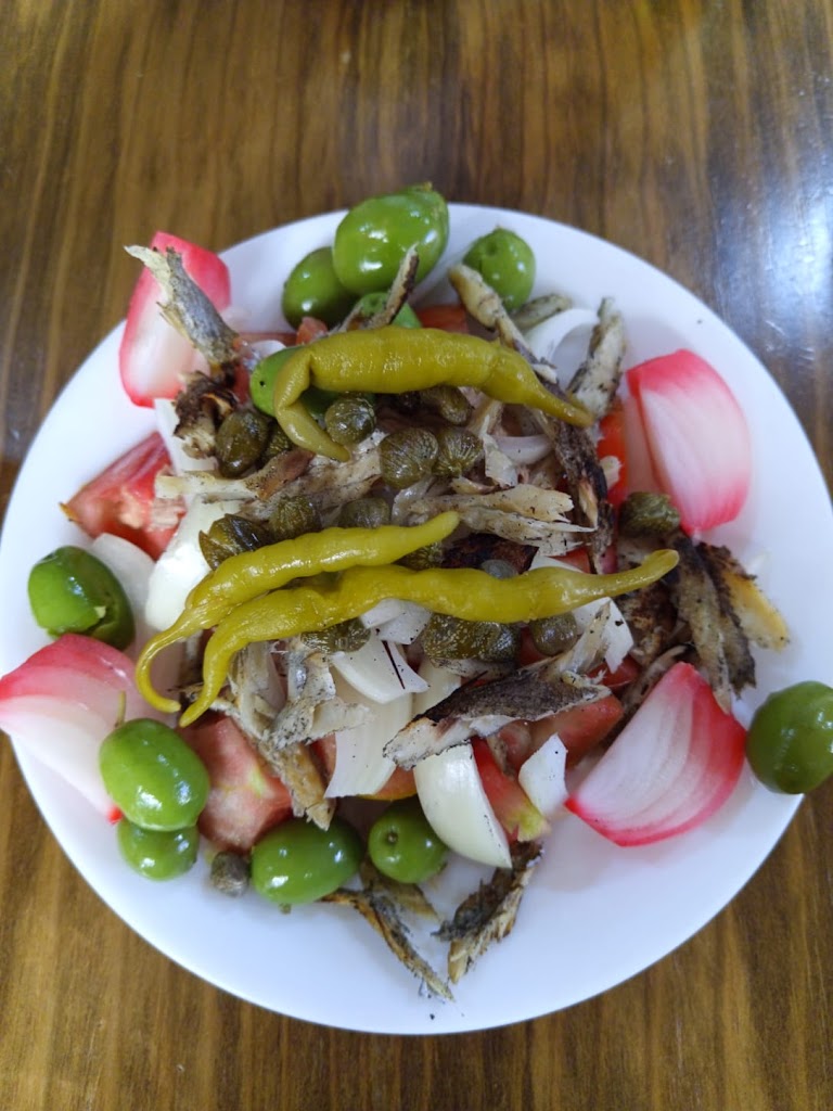 La Taberna Del Cid — Comida y bebida