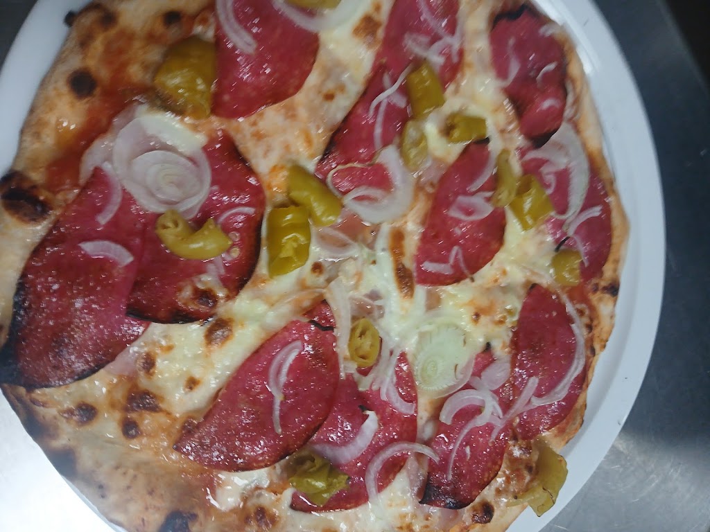 Pizza Extreme — Del propietario