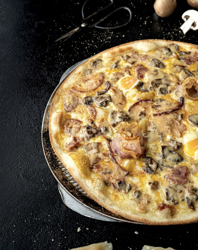Roman Pizza Vic — Comida y bebida