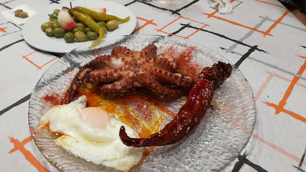 Taberna Asturiana — Comida y bebida