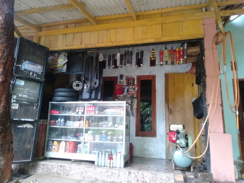 Andi Bengkel Tambal Ban