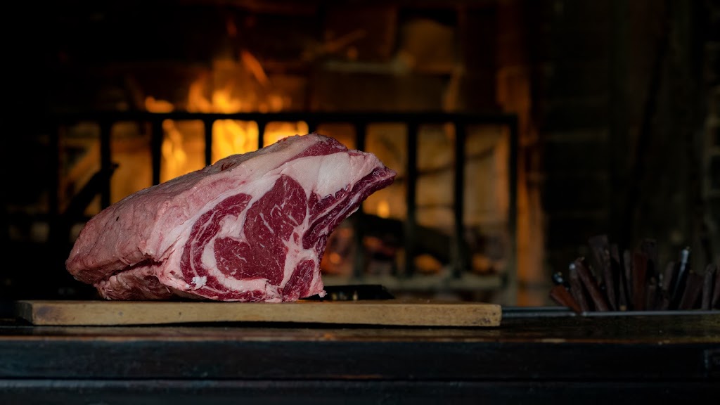 El Santo PIZZERIA Steak House. — Comida y bebida