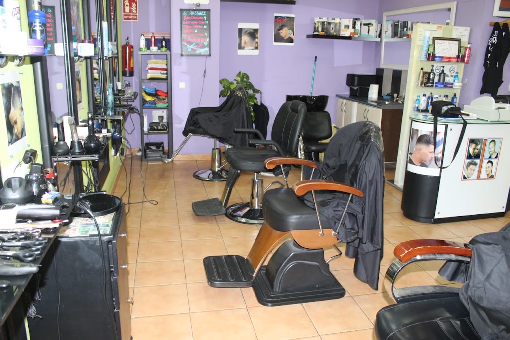 El Haddadi - Peluqueria Caballeros — Interior
