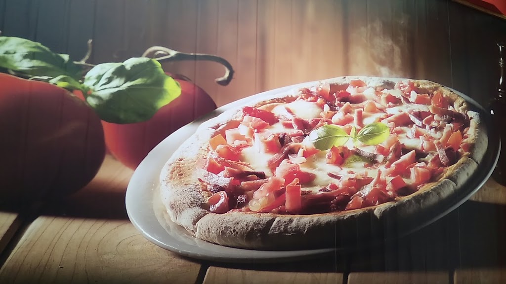 Dani's Pizza — Comida y bebida