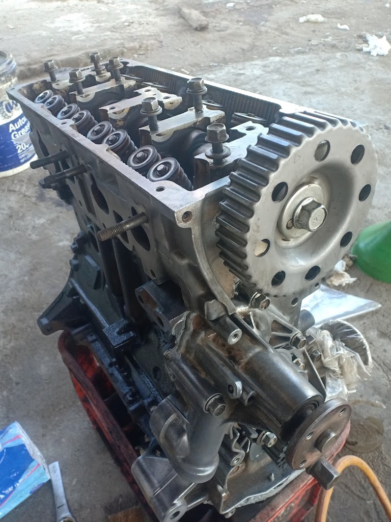 BENGKEL MOBIL RAIHAN MOTOR