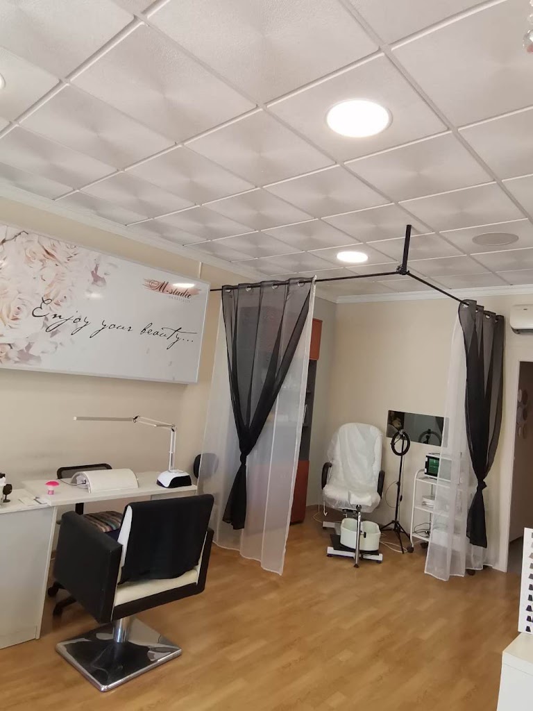 M Studio Peluqueria — Interior