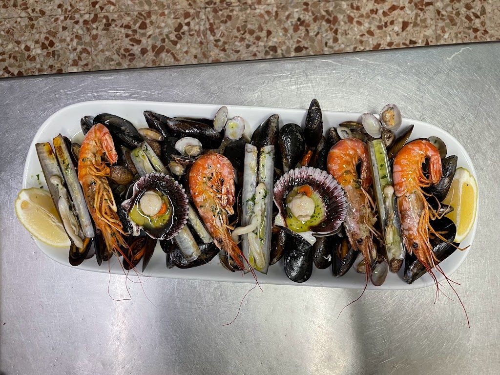 Restaurante Pension Galicia — Comida y bebida