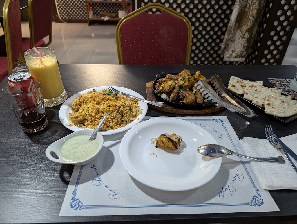 NEW AJWAA RESTAURANTE — Comida y bebida