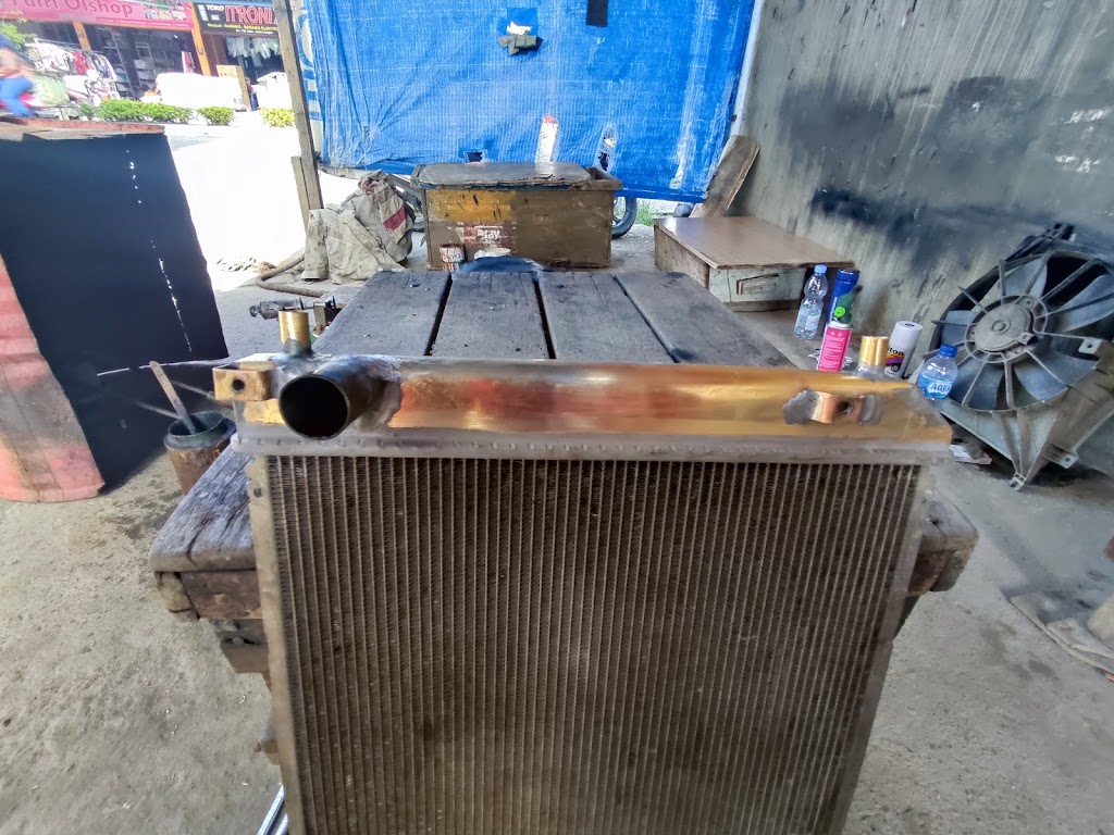 Buyung servis radiator