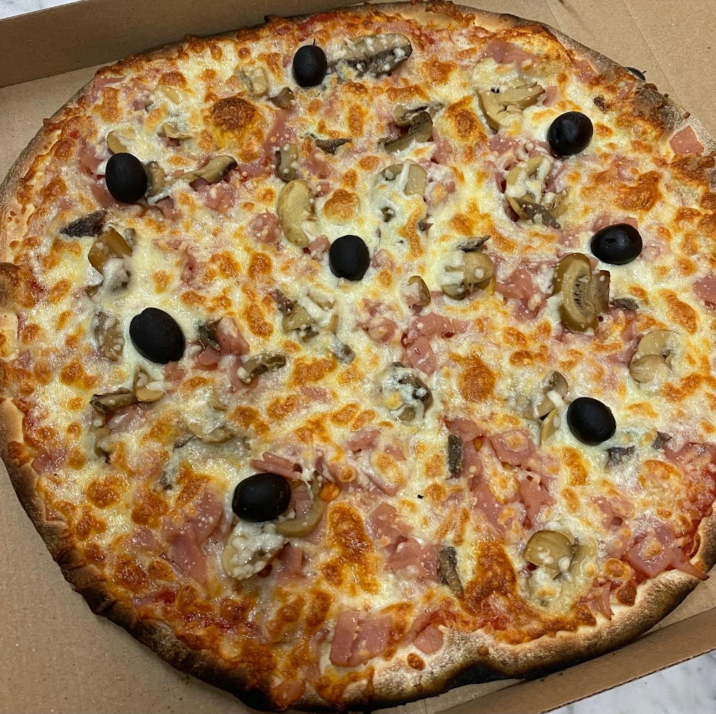 Il Fuoco Pizzeria — Comida y bebida
