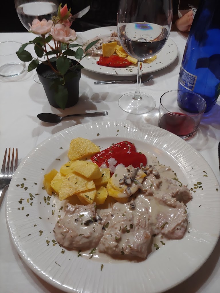 Posada Arco de San Miguel — Comida y bebida