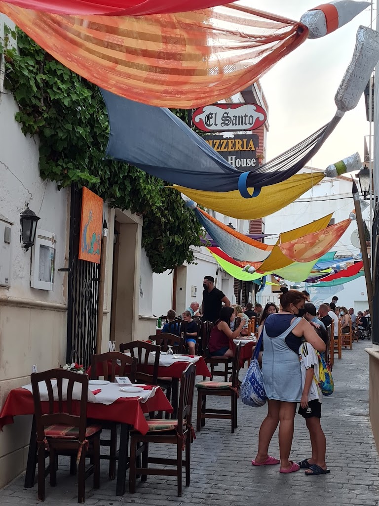 El Santo PIZZERIA Steak House.