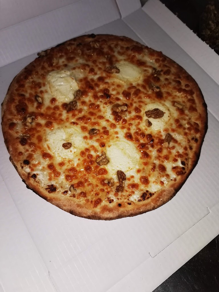 Carpi Pizza Arenys — Comida y bebida