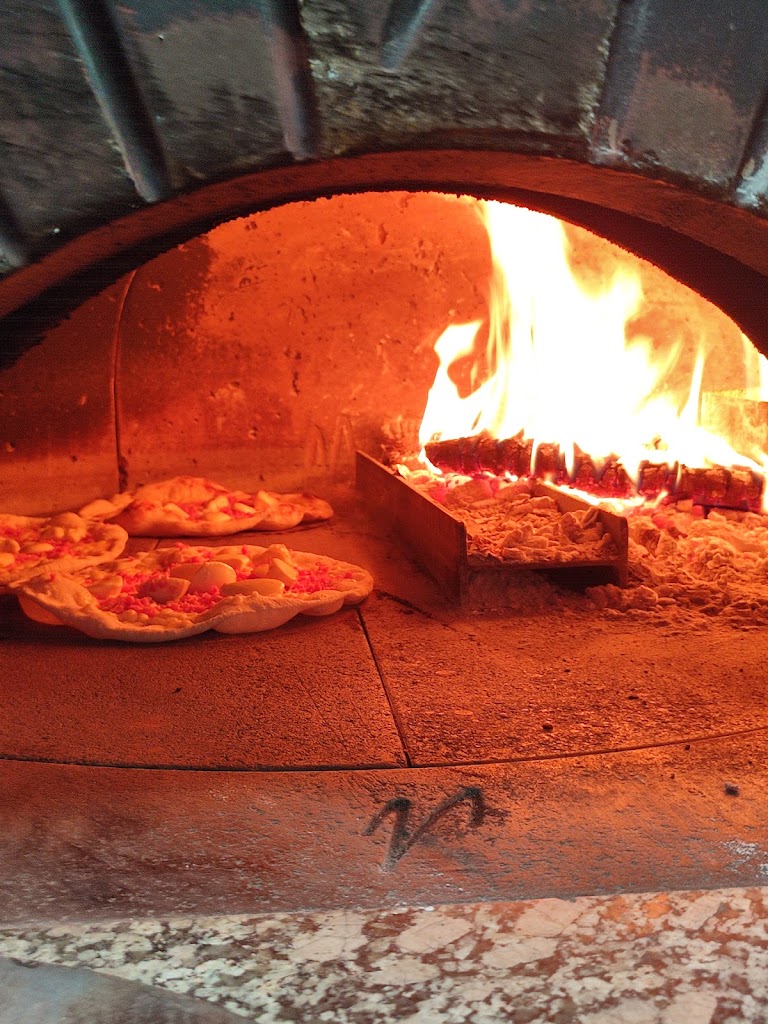 I Romani Pizza — Comida y bebida