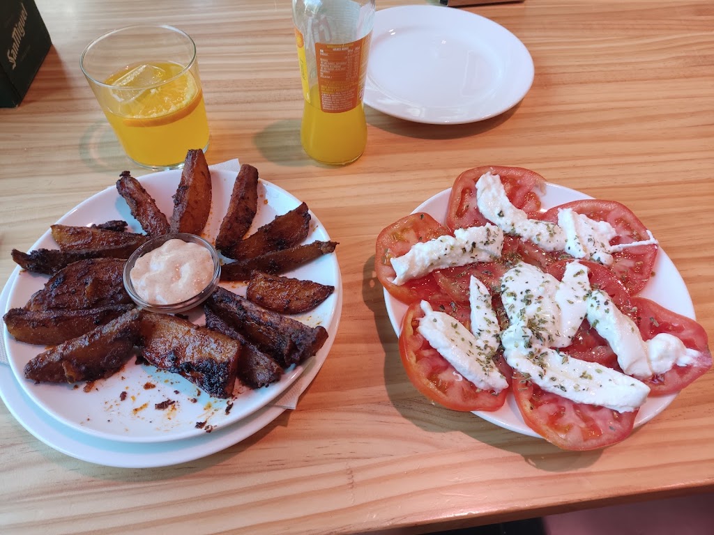 Porcus Calella — Comida y bebida