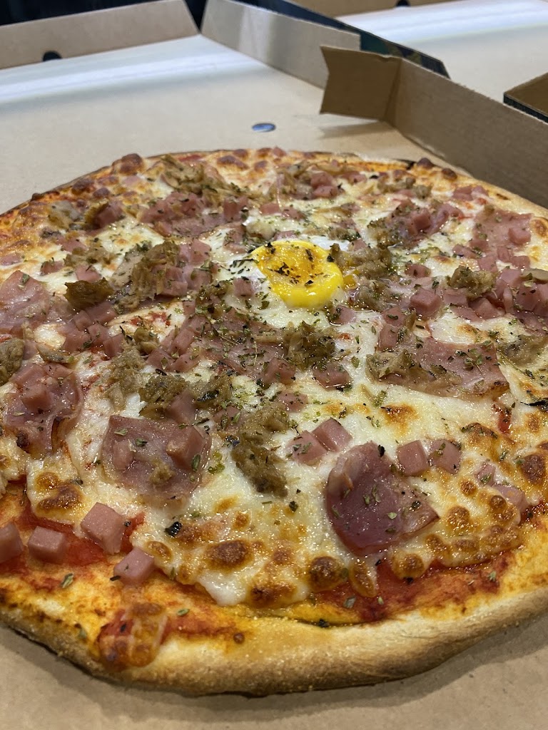 Pizzeria Gayra — Comida y bebida