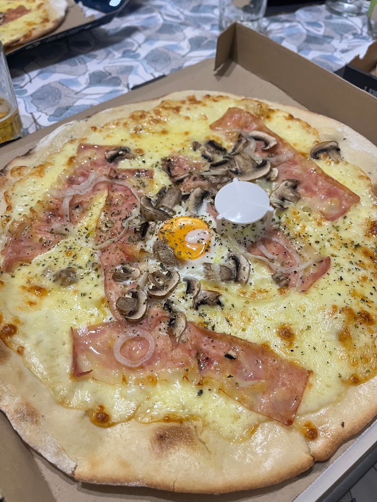 Pizza Mow — Comida y bebida
