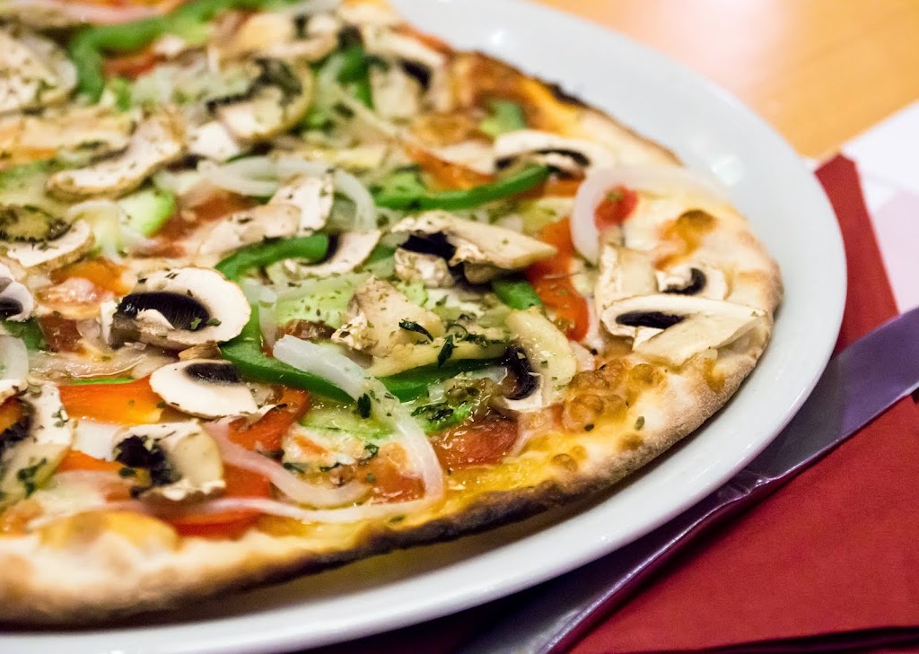 Pizzeria Vesubio — Comida y bebida