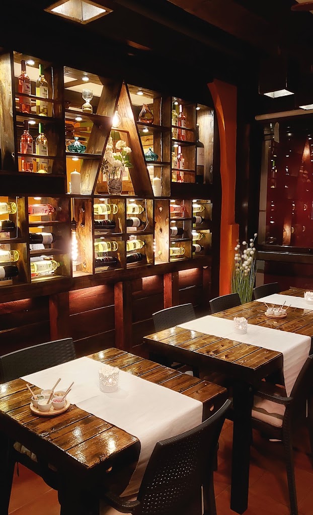 Asador El Quebracho Parrilla Argentina — Ambiente