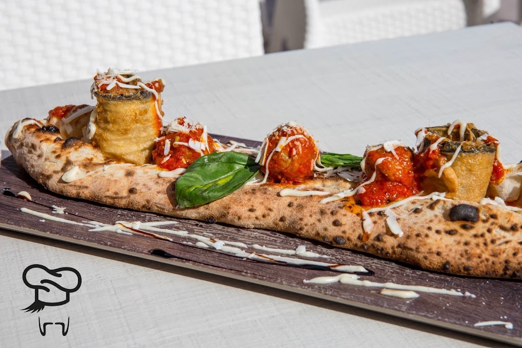 L'Artista Pizzeria Napoletana — Comida y bebida