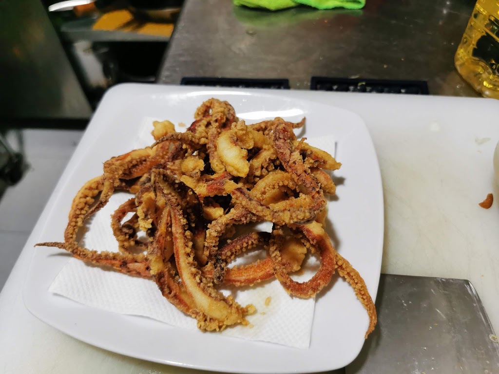 Bar La Cronica — Comida y bebida