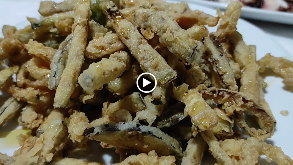 Restaurante Braseria Andaluza — Videos