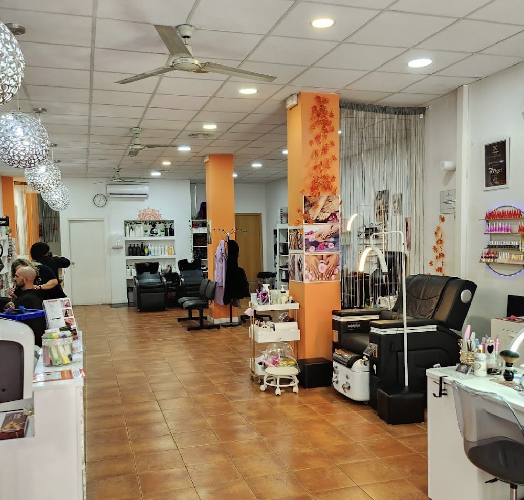 PELUQUERIA/ESTETICA & NAILS MARCO & JANETH