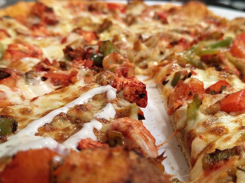 Pizzeria Creu — Comida y bebida