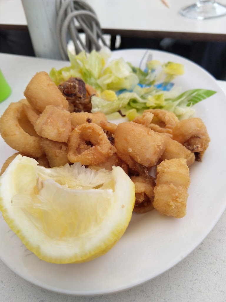El Arco — Comida y bebida