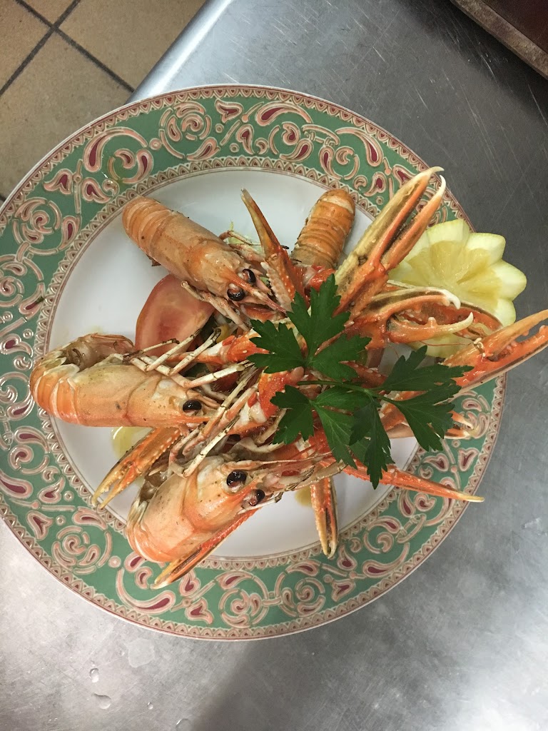 El Palanqui — Comida y bebida