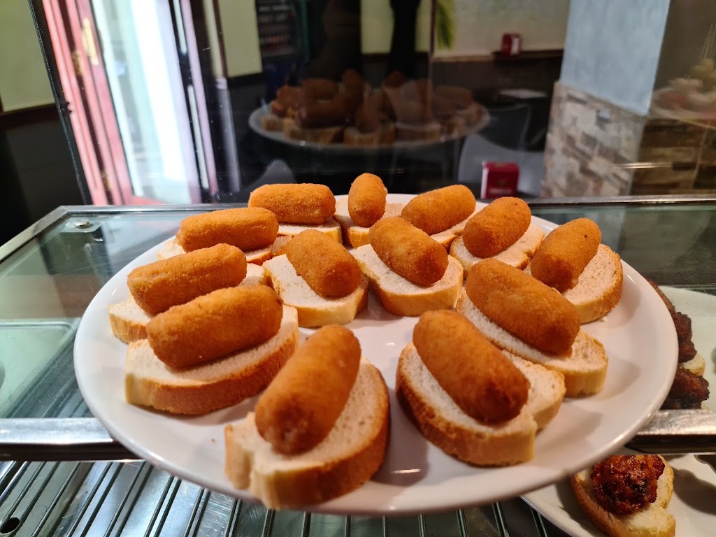 Taberna Lainoa — Comida y bebida