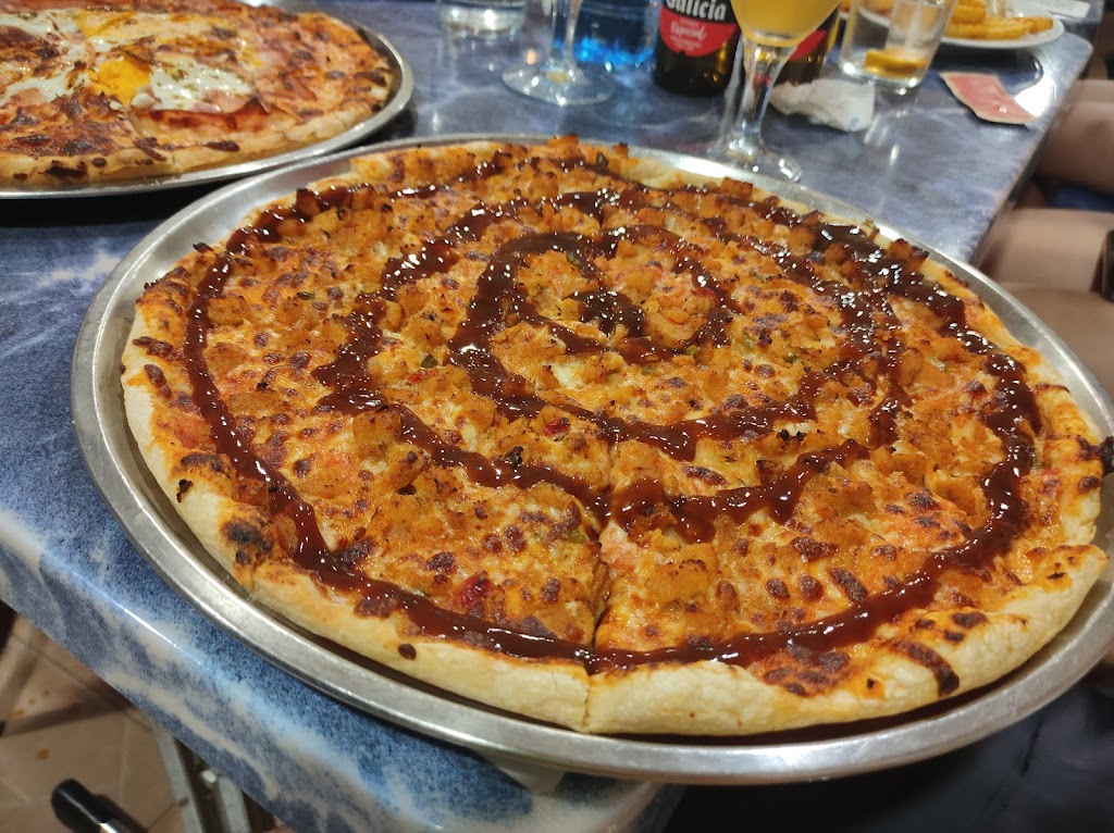 Pizzeria Venecia — Comida y bebida
