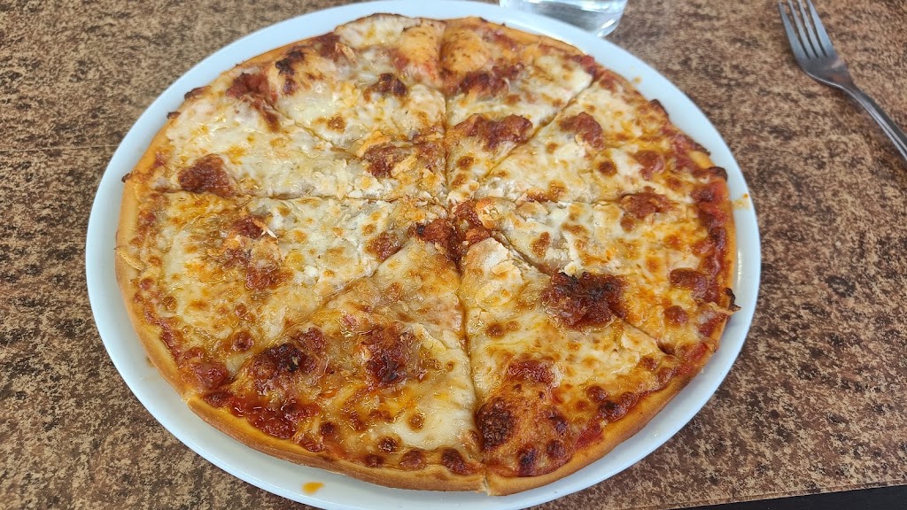 Pizzeria La siempreviva — Comida y bebida