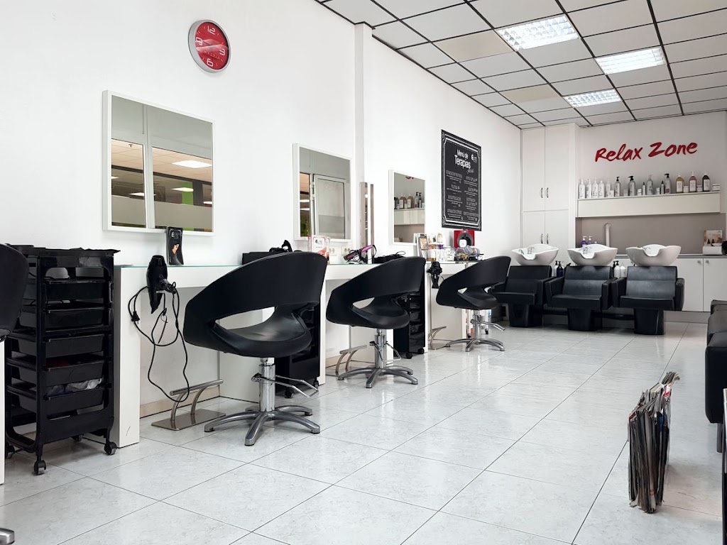 Elite peluqueros openmall — Interior