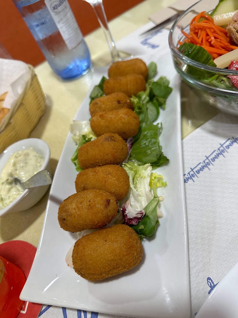 Tasca Juanito — Comida y bebida
