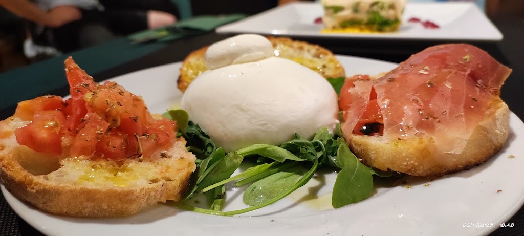 Restaurante Pizzeria Mamma Lucia — Comida y bebida